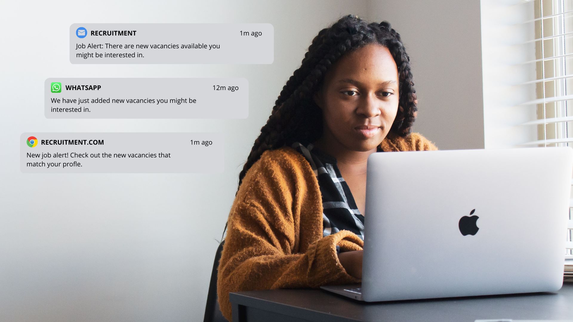  Woman looking at laptop surrounded by different notifications